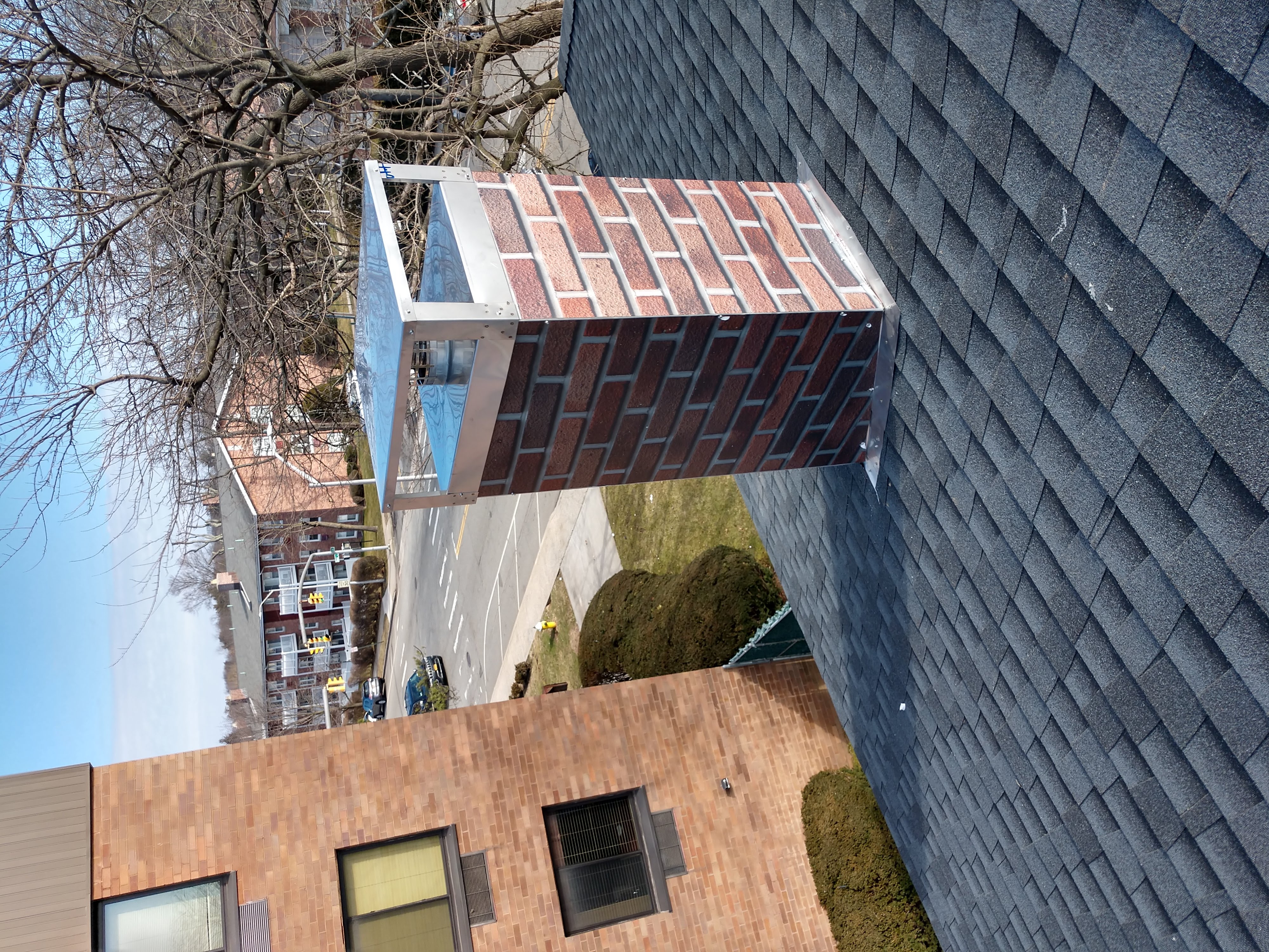 New elastomeric sealant applied to chimney crown in Levittown, NY