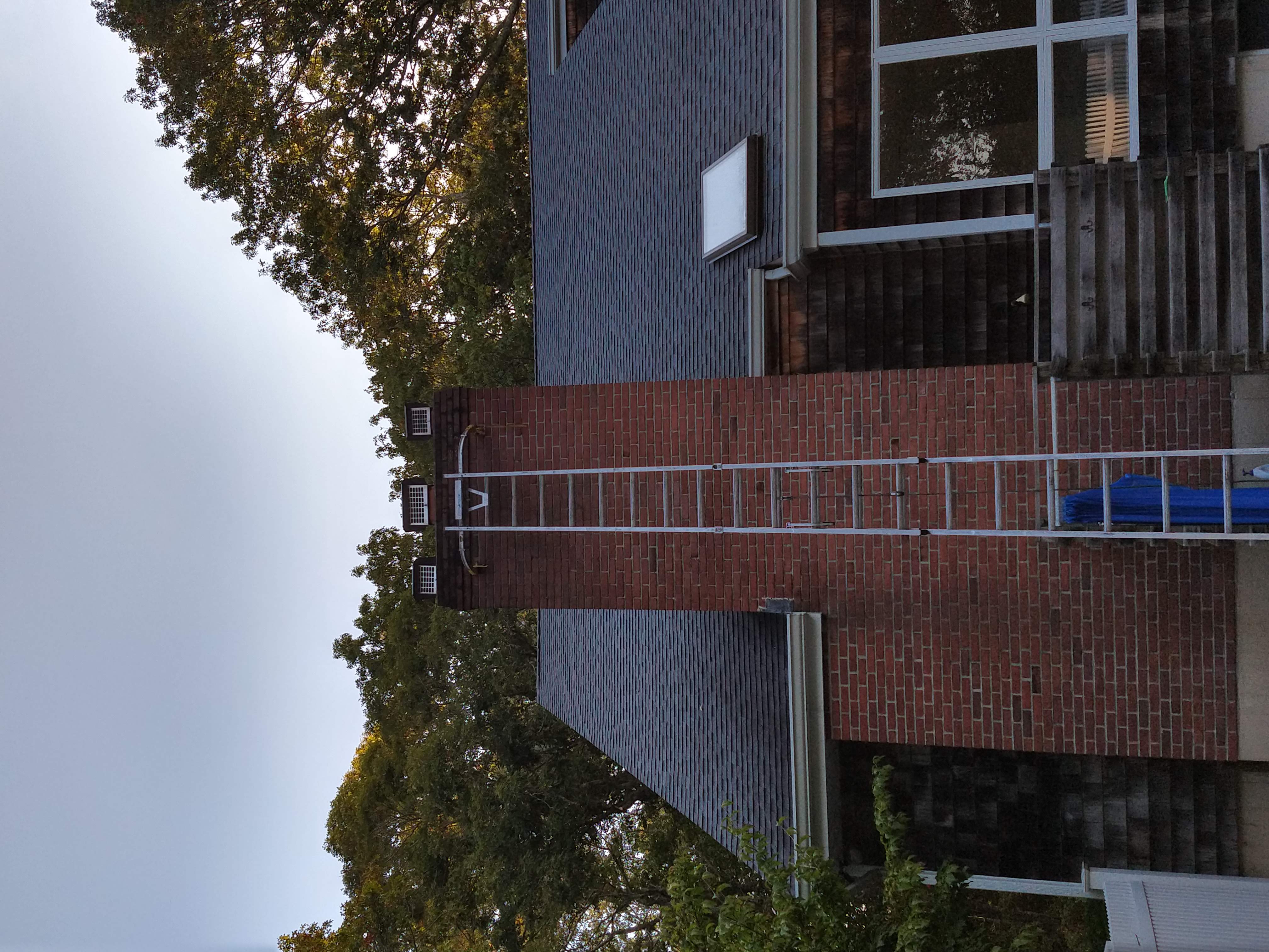 Draft-reducing chimney damper fixing heat loss in Levittown, NY